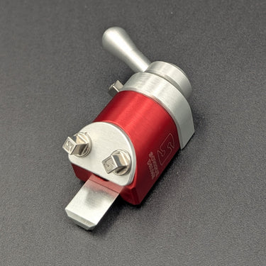 Front view of the NATO-1 with a clear anodized finish and red trim.