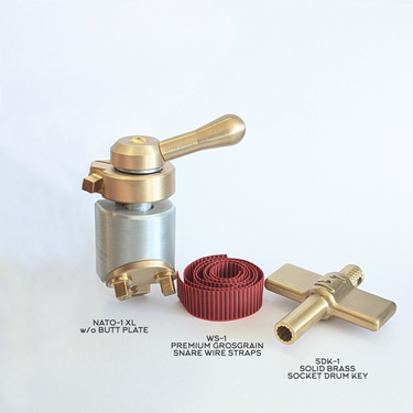 Accessory bundle by Sonique Drums featuring the original NATO-1 XL in brass throw off with a set of Poly Pro snare wire straps and the socket drum key. Without butt plate