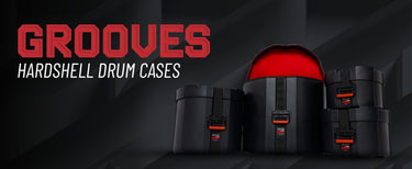 Four black hardshell drum cases displayed against a dark gray background, with one case open to reveal a bright red interior. Large red and white text on the left reads 'GROOVES HARDSHELL DRUM CASES'.